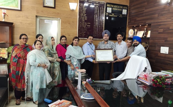 Director Agriculture Jammu, Dr AS Reen and his team posing with NABL accreditation certificate.