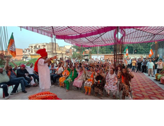 BJP leader Surjeet Singh Slathia addressing a party rally in Samba district on Monday.