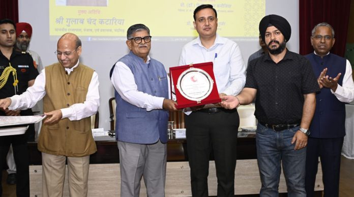 Principal, Government Polytechnic Jammu, Arun Bangotra receiving award in a function at Chandigarh.