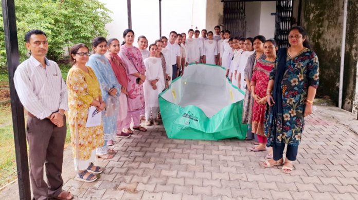 Students of GDC for Women Kathua display the gifted vermibed during training workshop.