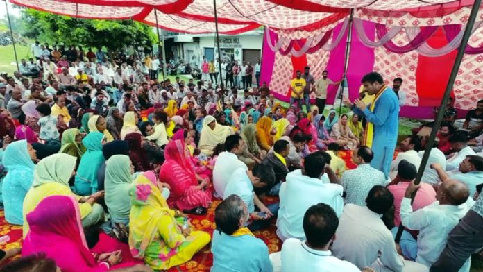 Independent candidate from Udhampur East, Pawan Khajuria addressing election meeting on Tuesday.