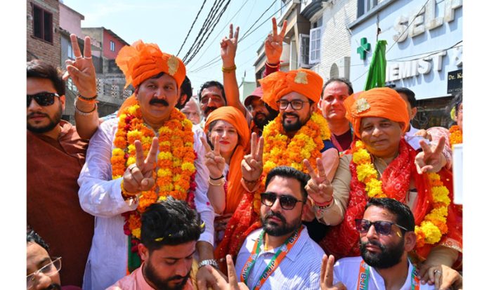 BJP leader, Anurag Thakur accompanying party candidate from Jammu West, Arvind Gupta for filing nomination papers in Jammu on Monday.