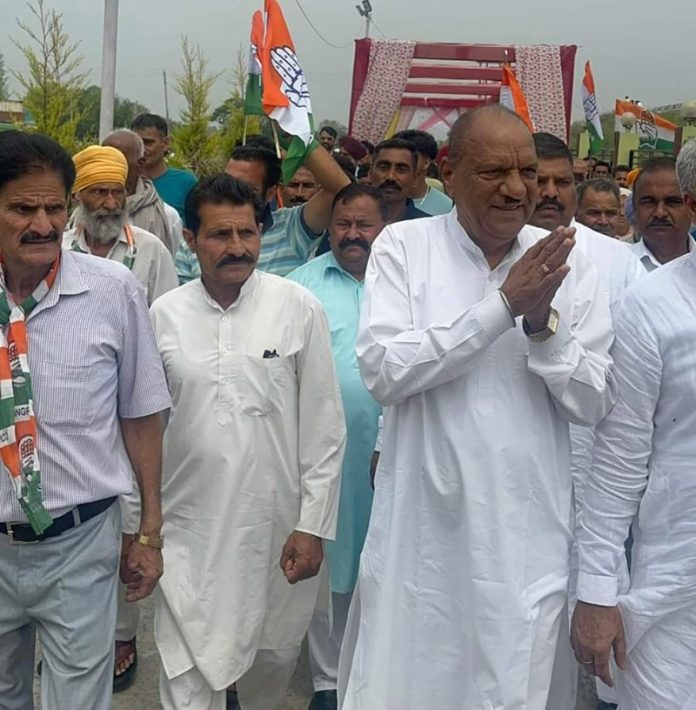 Cong leader Mula Ram during poll campaign in Marh on Thursday.