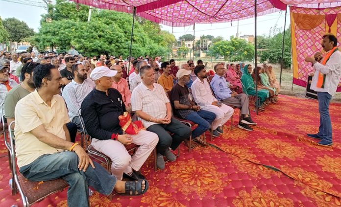 Arvind Gupta, senior BJP leader addressing a public meeting in Jammu West on Wednesday.