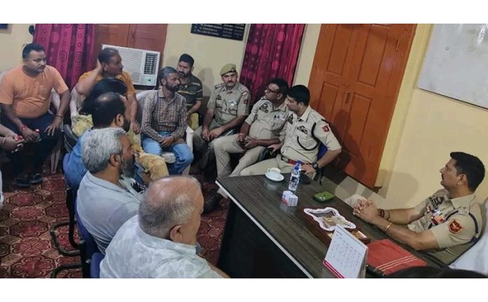 SP South Ajay Sharma chairing a meeting at Bagh-e-Bahu on Monday.