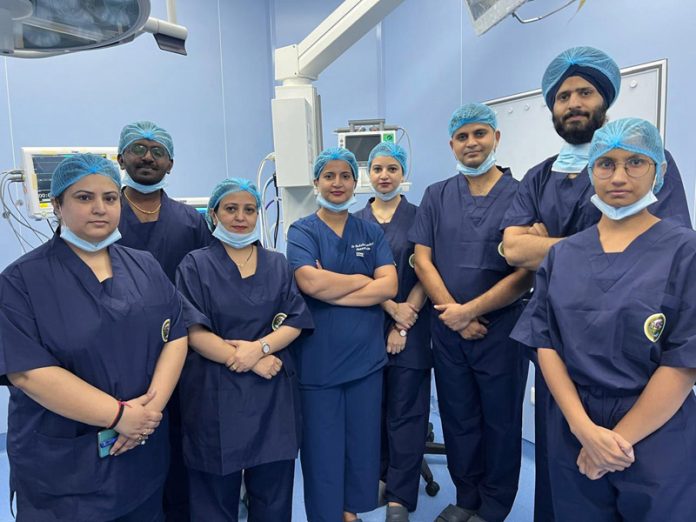 The team of doctors posing after conducting thyroid tumor surgery at AIIMS Jammu on Monday.