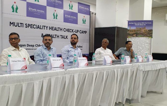 Specialist doctors from Fortis posing during awareness cum health check-up camp at Jammu.